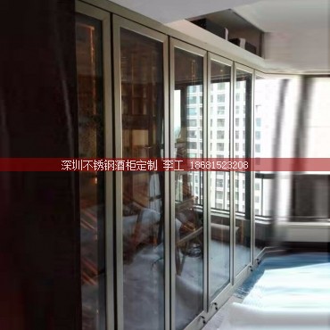 珠海某会所定制香槟金不锈钢酒柜实木层架